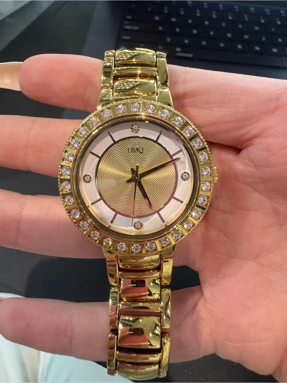 New DMQ Women’s Gold-Tone Round Dress Watch w/ Swirl Dial, Crystal Bezel